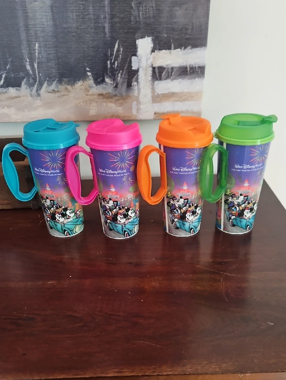 Four Disney Reusable Mugs For Disney Parks